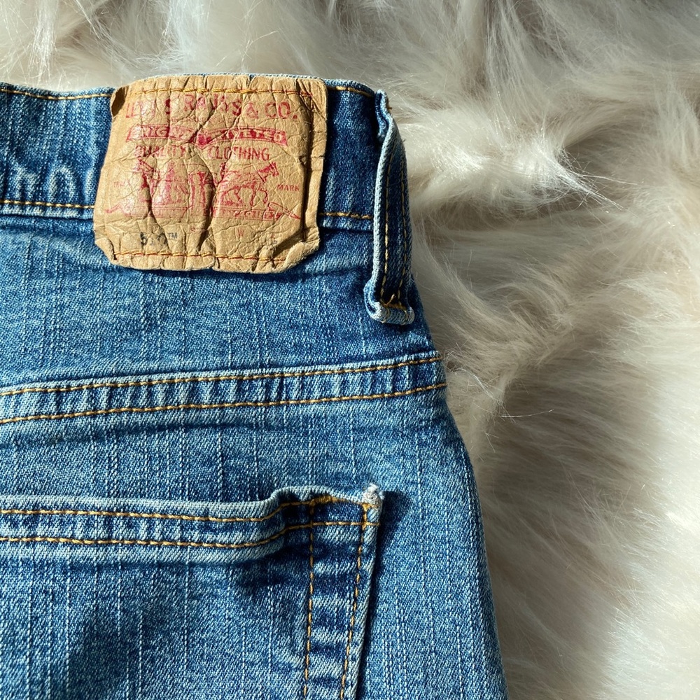 Hand distressed Levi’s cutoff denim shorts